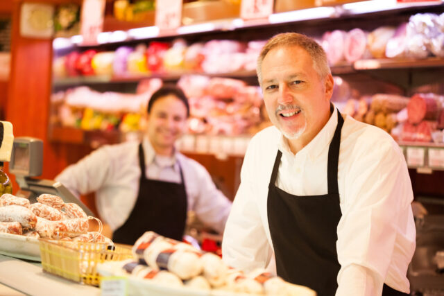 People working in a grocery store